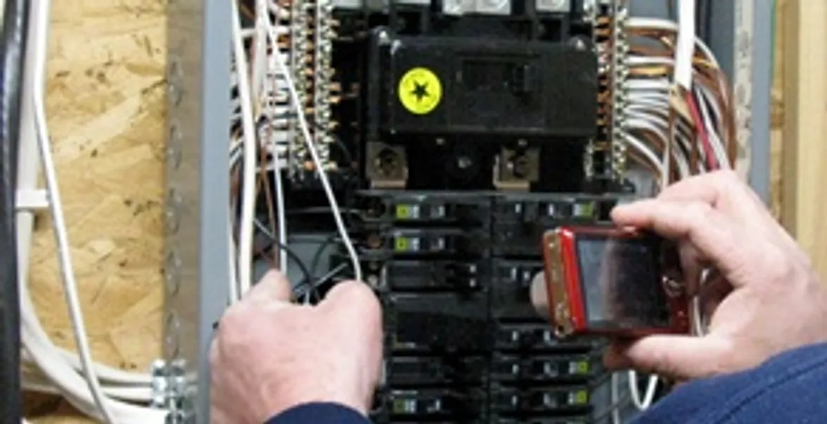 Home electrical inspection of circuit breaker panel by licensed electrician in Clearwater, FL