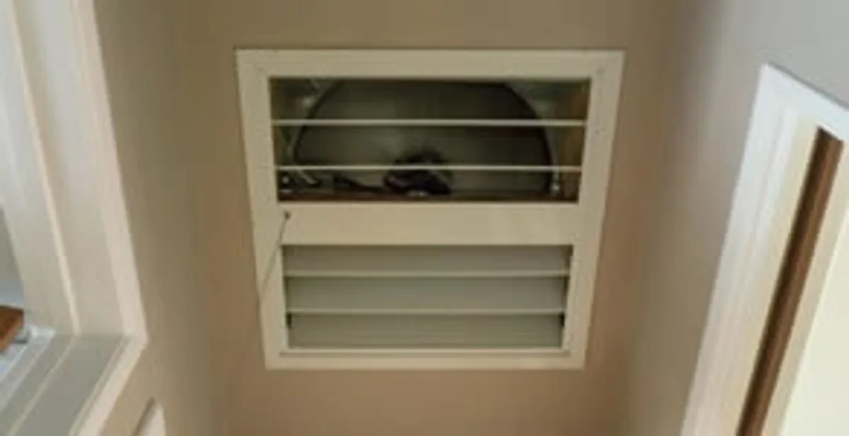 whole house fan installation services with ceiling-mounted ventilation system in Clearwater, FL